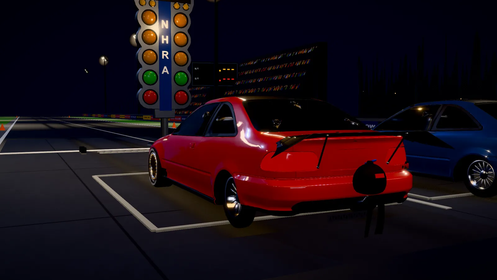 A drag car staged at the Christmas tree